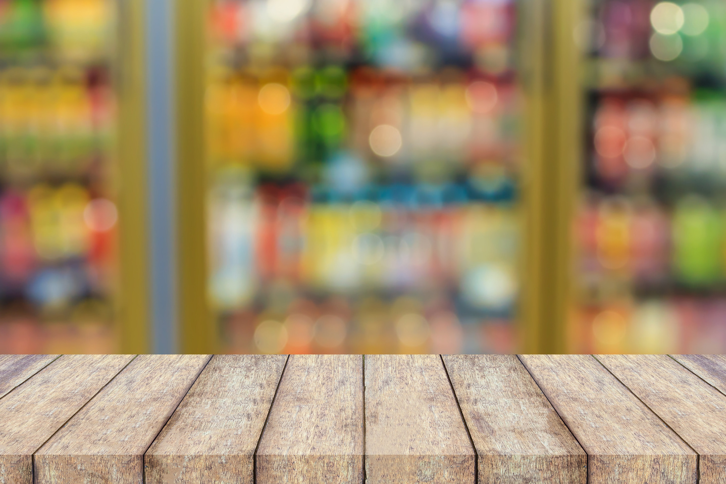 convenience store refrigerator shelves blurred background